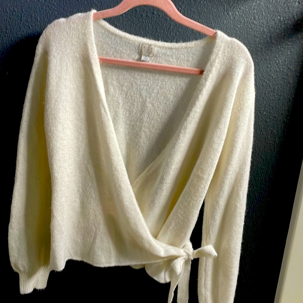 Cream sweater.